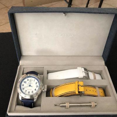 Nautica men's watch with replaceable wristbands and Nautica tool. Includes box. Really good condition. $95