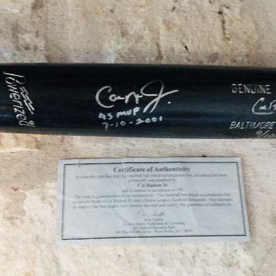 Cal Ripken Jr (HOF) signed game day bat in silver sharpie. Estate sale price: $595
