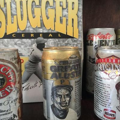 Roberto Clemente Late 1990s Slugger Frosted Flakes with original cereal still in it (unopened) $5.  Beer cans with Roberto Clemente .. $5...