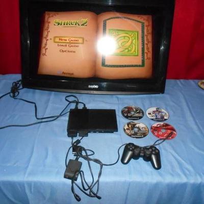 Playstation 2 with Controller, Cords and 4 Games