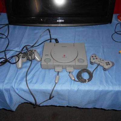 Playstation w 2 Controllers and Cords