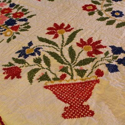 Spectacular, hand-made, vintage quilt - cross stitched flower baskets, floral wreaths, and flowers adorn this full size quilt.  White on...