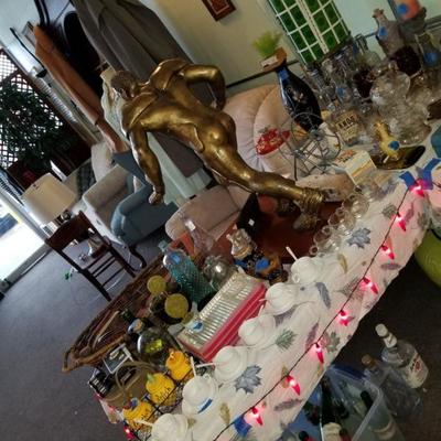 Table full of an engravable gold flaked football figurine, and tons of other delightful vintage and antique goodies 