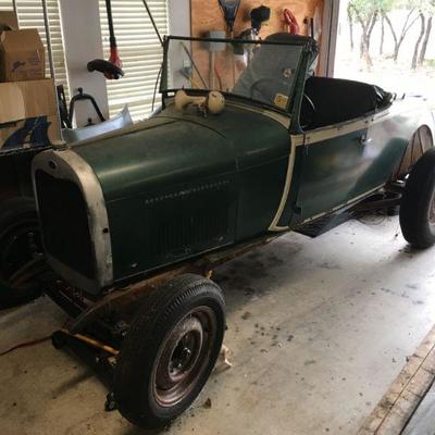 1929 Roadster has title , fenders , running boards soft top and parts to be completed. 