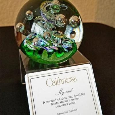 Caithness paperweights. Prices range from $30 (unlimited edition) to $40 (limted edition). Includes original boxes. 