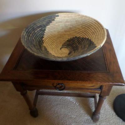 Vintage side table with native american handmade baket