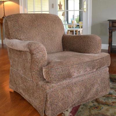 One of a pair of Furniture Guild swivel chairs