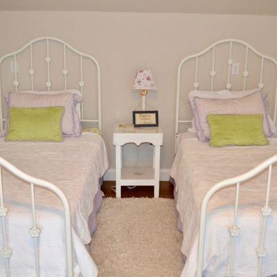 Pair of cast iron twin beds