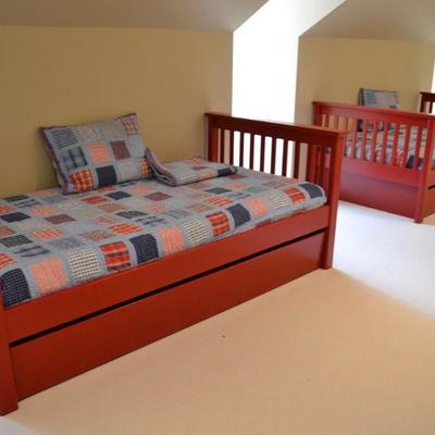 Pair of twin beds with trundles
