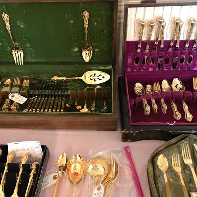 Beautiful sets of Gold plated flatware along with misc extra serving pieces 