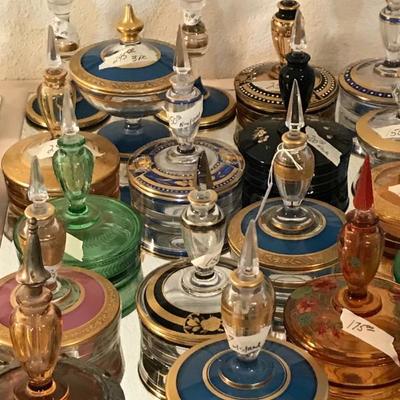 Over 50 Fostoria 3 piece powder perfumes from the 1920s