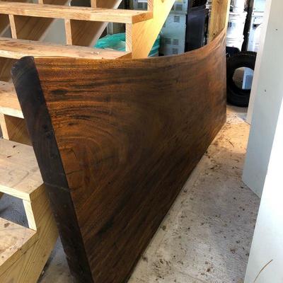 Live edge  table - it does have leg supports and will be set up for the sale.  We think it was used as a desk. 
It is beautiful.  4 men...