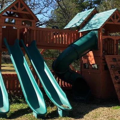 Huge playscape.  4 slides, 3 swings, climbing wall, club house etc.   You must disassemble and remove yourself.  