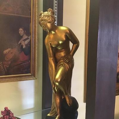 Gold girl statue 