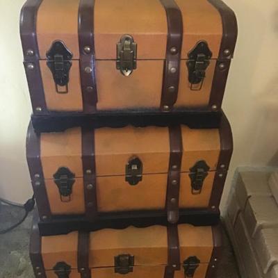 Three decorative suitcases 