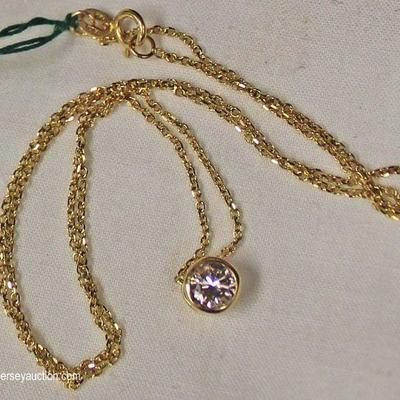 14 Karat Yellow Gold Â½ CTW Diamond Solitaire Pendant and Chain â€“ auction estimate $500-$1000 