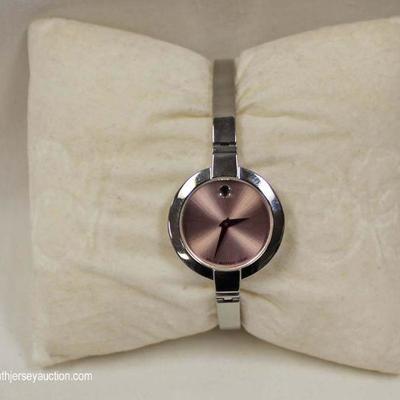 Ladies Pink Face Bangle Style Movado Watch â€“ auction estimate $100-$300 