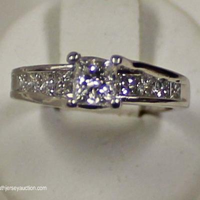 Platinum Â½ Karat Center Diamond Ring 1 CTW â€“ auction estimate â€“ $600-$1200 