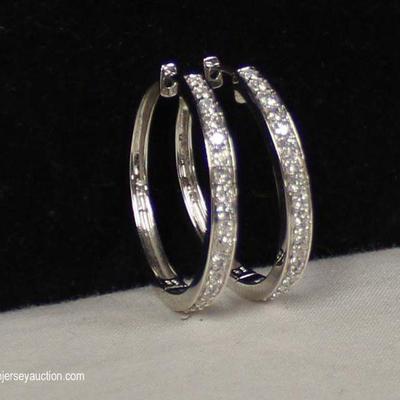 14 Karat White Gold Â½ CTW Diamond Hoop Earrings â€“ auction estimate $500-$1000 