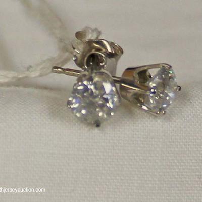  14 Karat White Gold 1 ctw Diamond Stud Earrings â€“ auction estimate $500-$1000

  