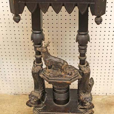  ANTIQUE Marble Top Pedestal in the Black Forest Design with Carved Dolphins and Deer â€“ auction estimate $300-$600

  