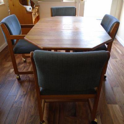 Dinette Set shown with leaf installed 4 chairs