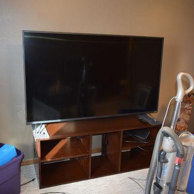 Flat Screen TV, Stand, & Vacuum Cleaner