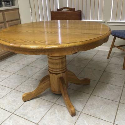oak pedestal kitchen table 
