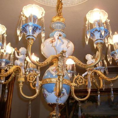 blue chandelier with cherubs
