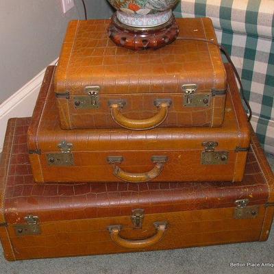 Three Antique Travel Cases, the first has some of the original Vanity Products in it.