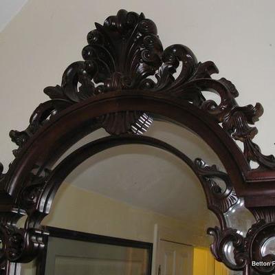 close up of carving on Mirror

