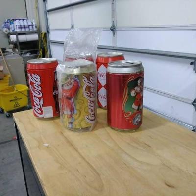 Five Coca Cola Piggy Banks(One with a suprise insi ...