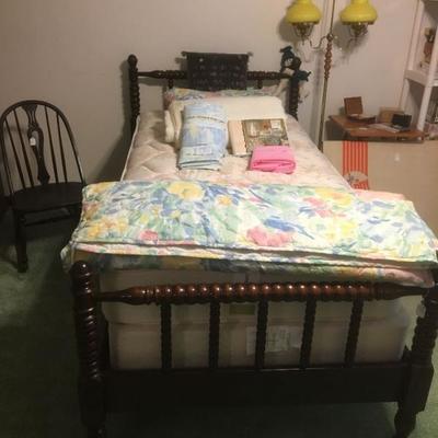 Antique Jenny Lind style twin bed with mattress and box springs