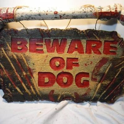 Beware of dog sign with giant bone