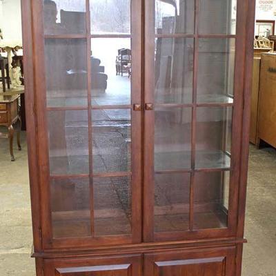 16 Pane Cherry China Cabinet by “Ethan Allen Furniture – American Dimensions” – auction estimate $200-$400
