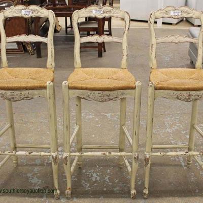  Set of 3 Country French Style Distressed Carved Rush Bottom Bar Stools â€“ auction estimate $100-$300 