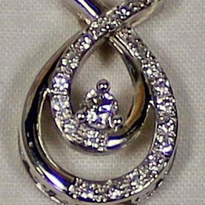  10 Karat White Gold Pendant with approximately .25 Diamonds – auction estimate $200-$400 