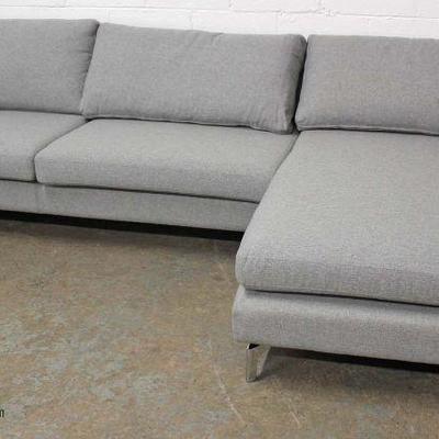  NEW Contemporary Grey Upholstered 2 Piece Sectional Sofa Chaise â€“ auction estimate $200-$400 