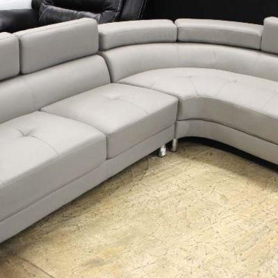  NEW Contemporary Grey Leather 2 Piece Sofa with Circular Chaise â€“ auction estimate $300-$600 
