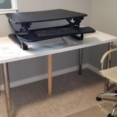 The adjustable desk has sold but the table is still available.
