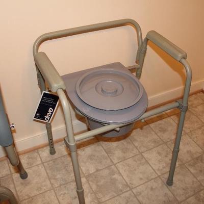 #203  NEW folding bedside portable commode

PRICE:  $24