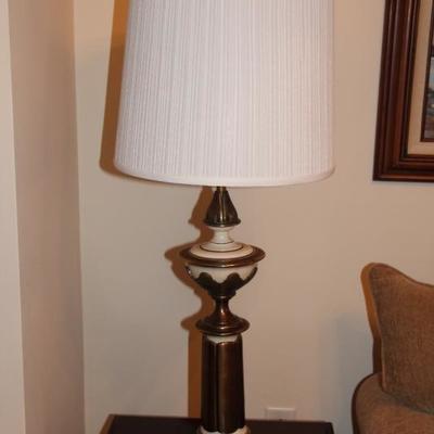 #509  Pair of brass and porcelain tall lamps with duck finials
36"T
PRICE: $30