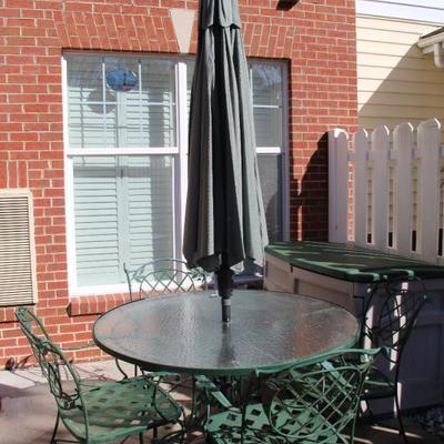 #401  7 pc Patio set - 48"Round tempered glass table, 4 armed chairs, umbrella, stand and cover
PRICE:  $70
