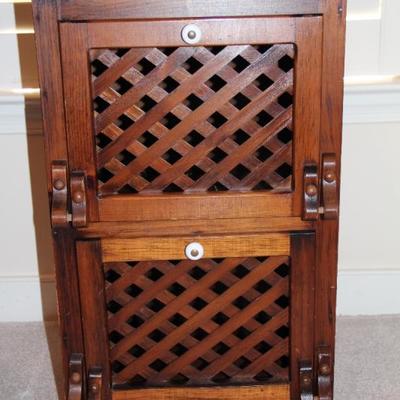 #310 Dark pine lattice front cabinet/side table
17 1/2"W x 13"D x 33 1/2"T
PRICE:  $25