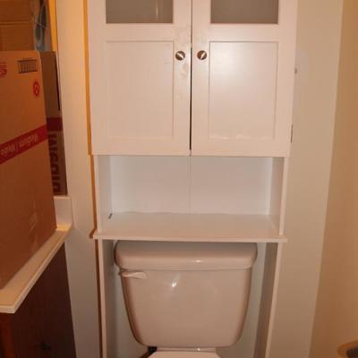 #205  Behind the commode shelf/cabinet unit
some water damage to bottom
PRICE:  $15