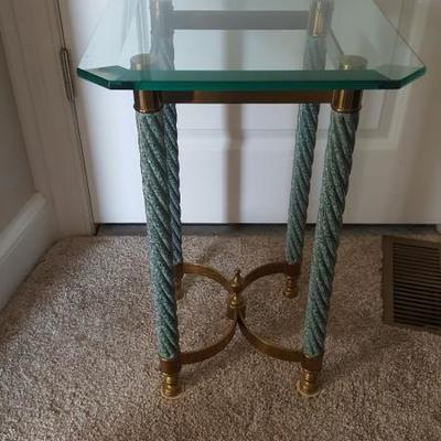 One of pair of small glass top barley twist brass legs