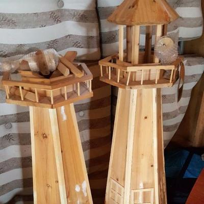 2 wooden lighthouses (appear to be handmade)