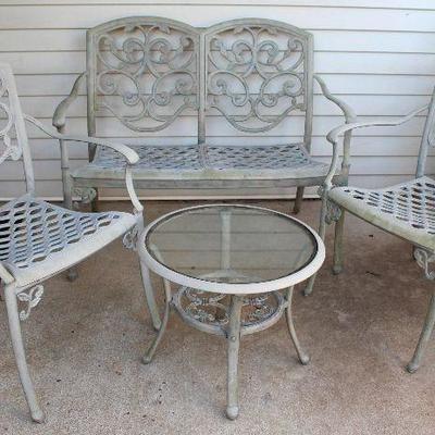 cast aluminum patio set - settee, two arm chairs, & low, round table