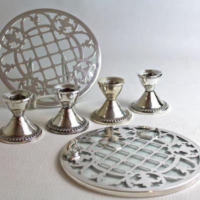 sterling candle holders, sterling over glass trivets