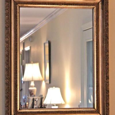 large mirror in antique gold frame